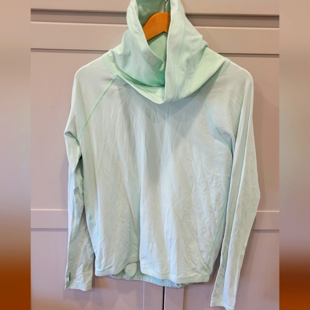 Lululemon pullover, funnel neck, color: sea foam color with thumb holes
